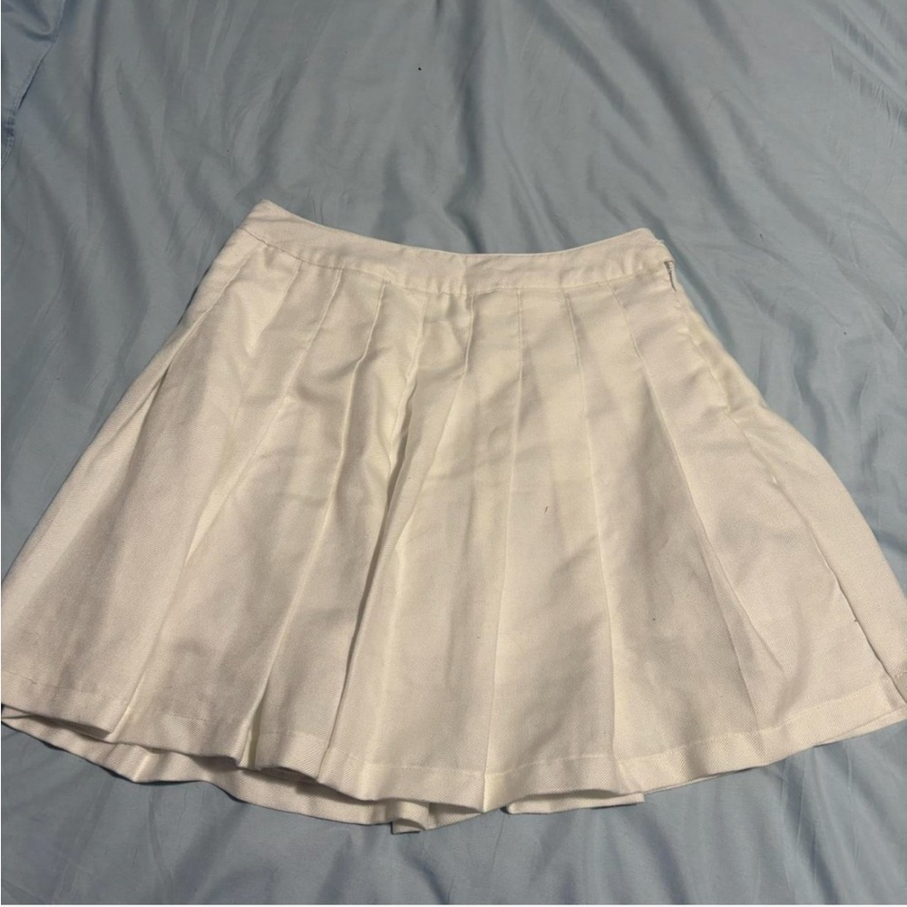 White pleated skirt